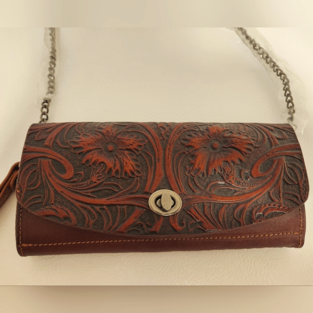 Montana West hand-tooled leather clutch